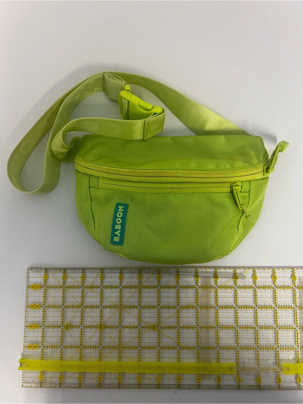 Baboon to the Moon Neon Green Waist Bag and Pink Mini Backpack Bag Duo